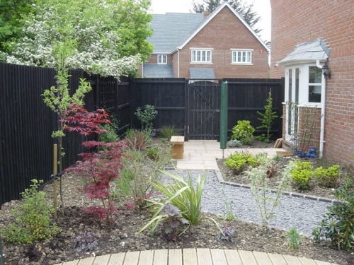 An attractive utility area directly off of the kitchen provides a sunny place