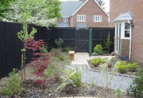 An attractive utility area directly off of the kitchen provides a sunny place